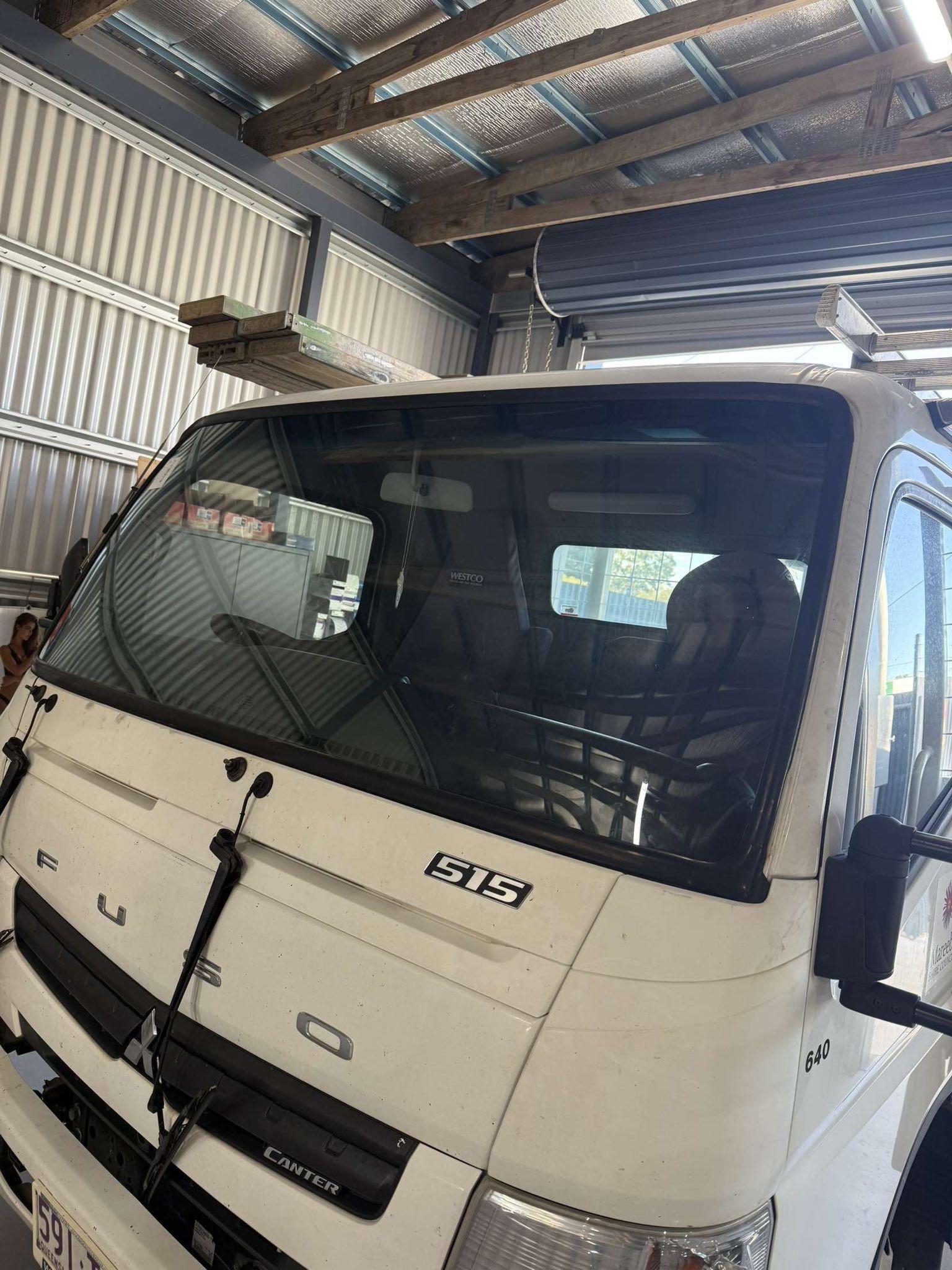 Close-up View of the Front Cab and Windshield of a White Fuso Truck — Far North Windscreens in Mareeba, QLD