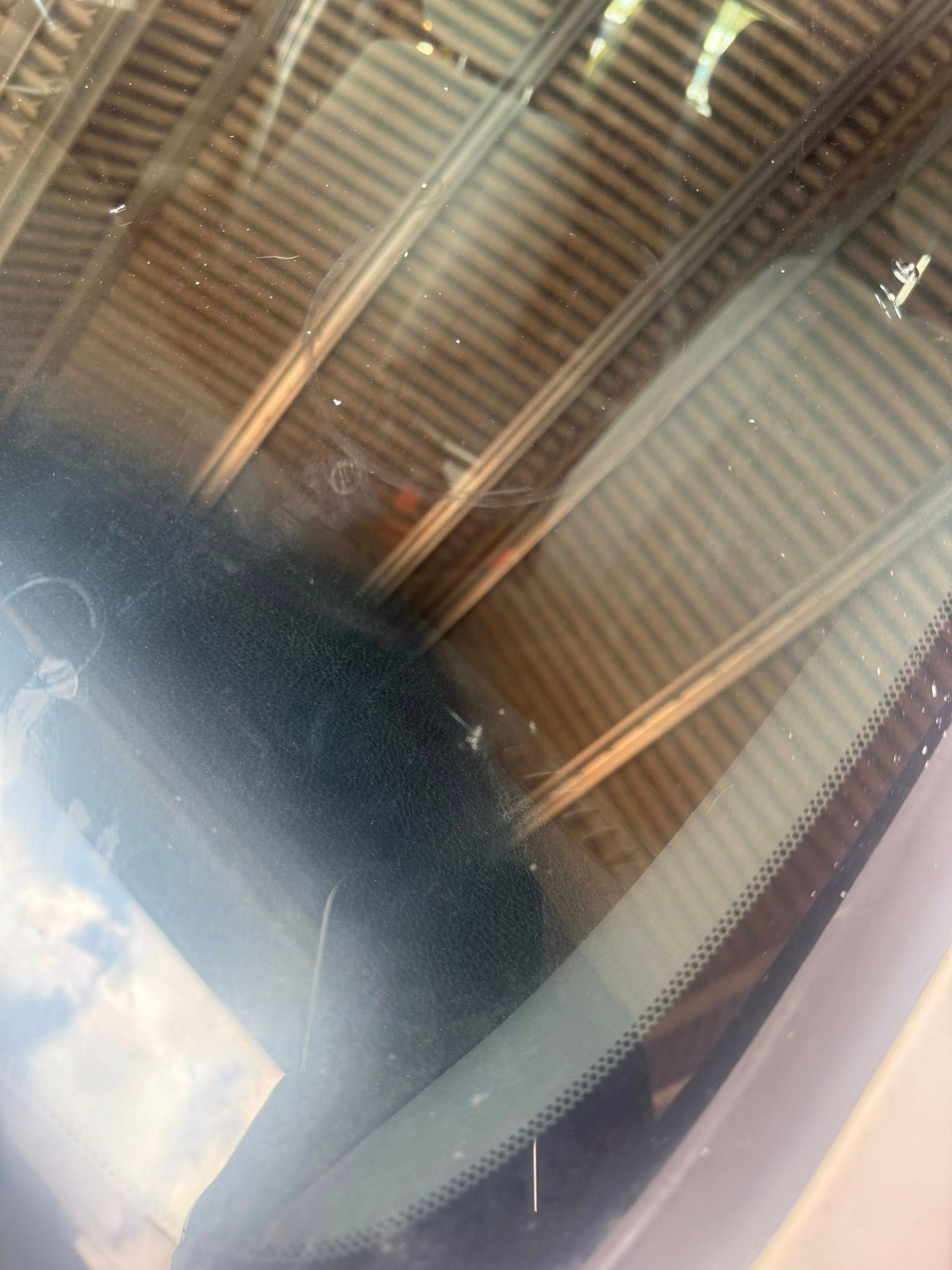 A Close-up View of a Car Windshield Showing a Small Crack — Far North Windscreens in Mareeba, QLD