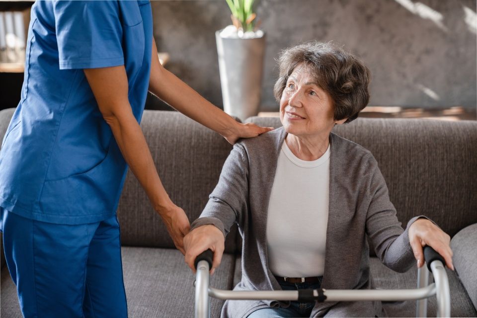 older woman with carer