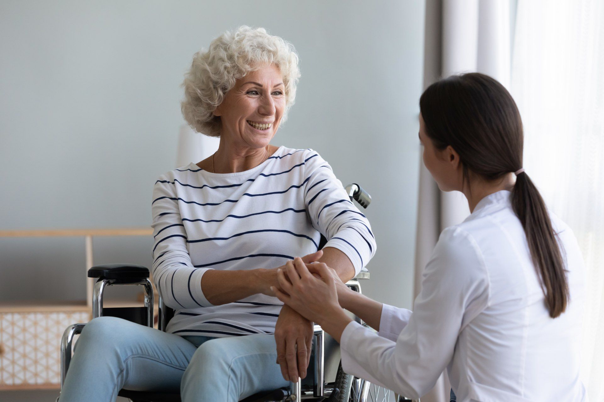 older woman with carer
