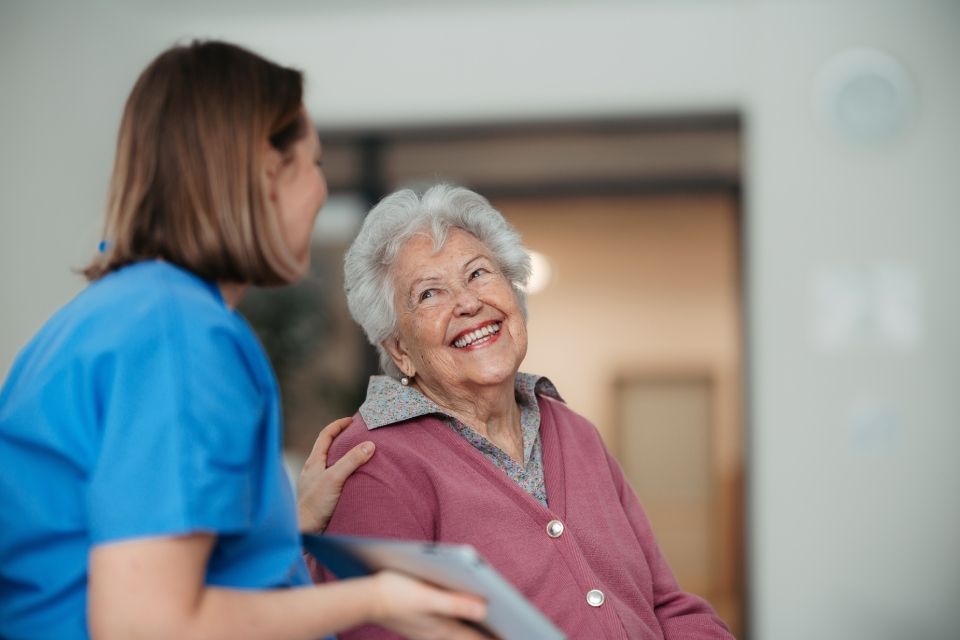 older woman with carer
