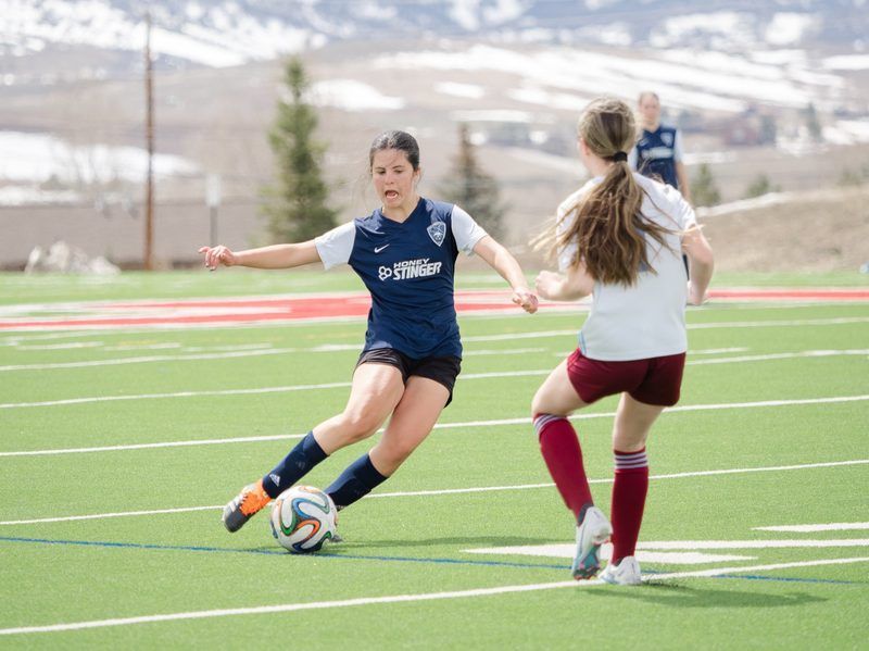 SSC player with snowy mountains behind