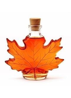 A bottle of amber bulk maple syrup.