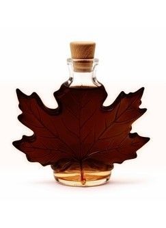 A bottle of processing grade bulk maple syrup.