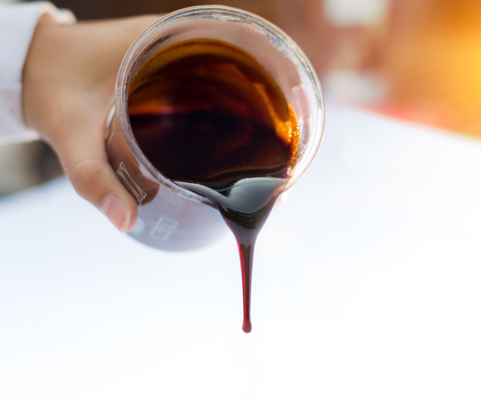 molasses poured from a glass jar