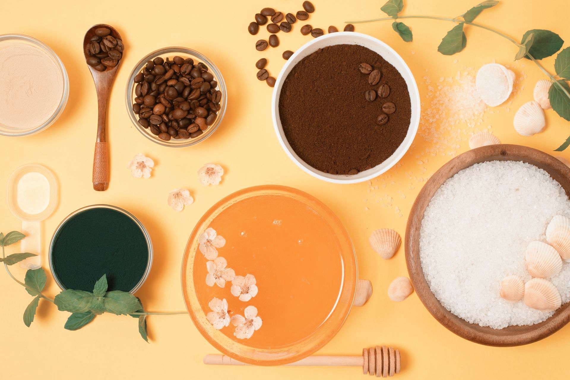 A bowl of sugar with seashells in it, coffee grounds, and honey with flowers in it - Sugar for Fermentation Products & Non-Food
