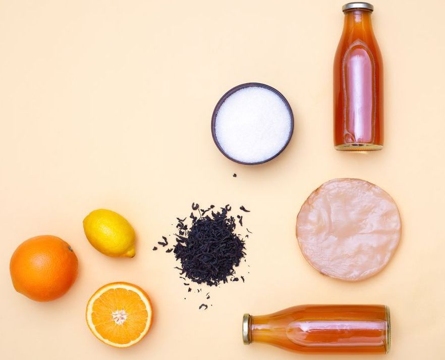 Ingredients for kombucha including sugar, scoby, tea, and citrus fruit Sugar for Fermentation Products & Non-Food