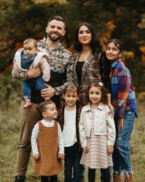 Dr. Nic West and his family at the beach