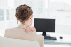 person with neck pain and back pain