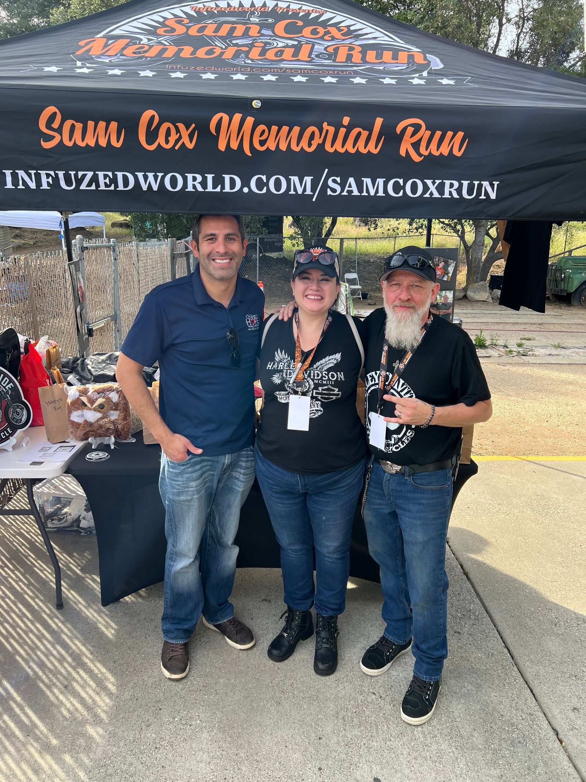 Efren Del Rio of Children's Hope with event coordinators Christina and Kevin