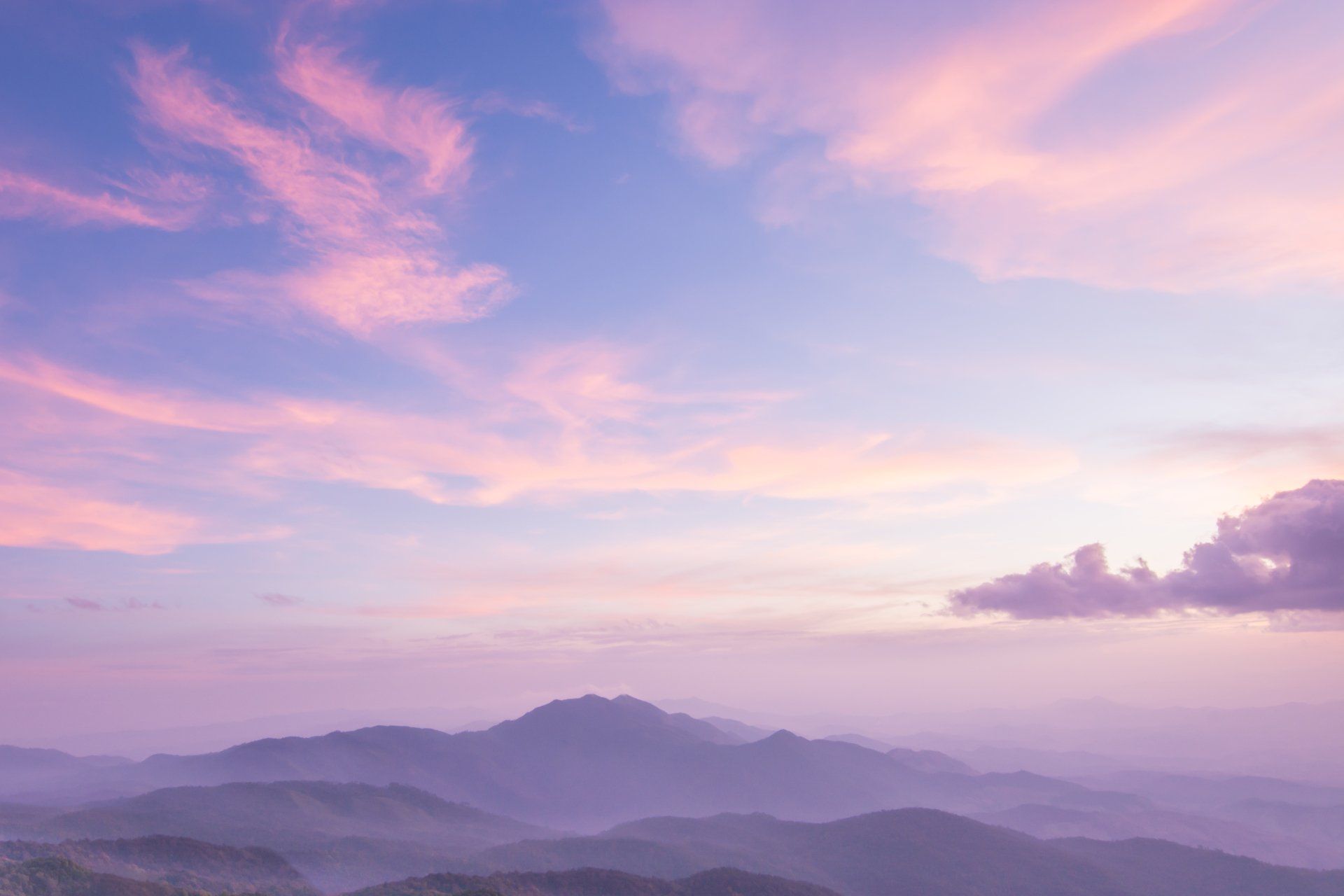 Peaceful mountain sunrise symbolizing hope and healing
