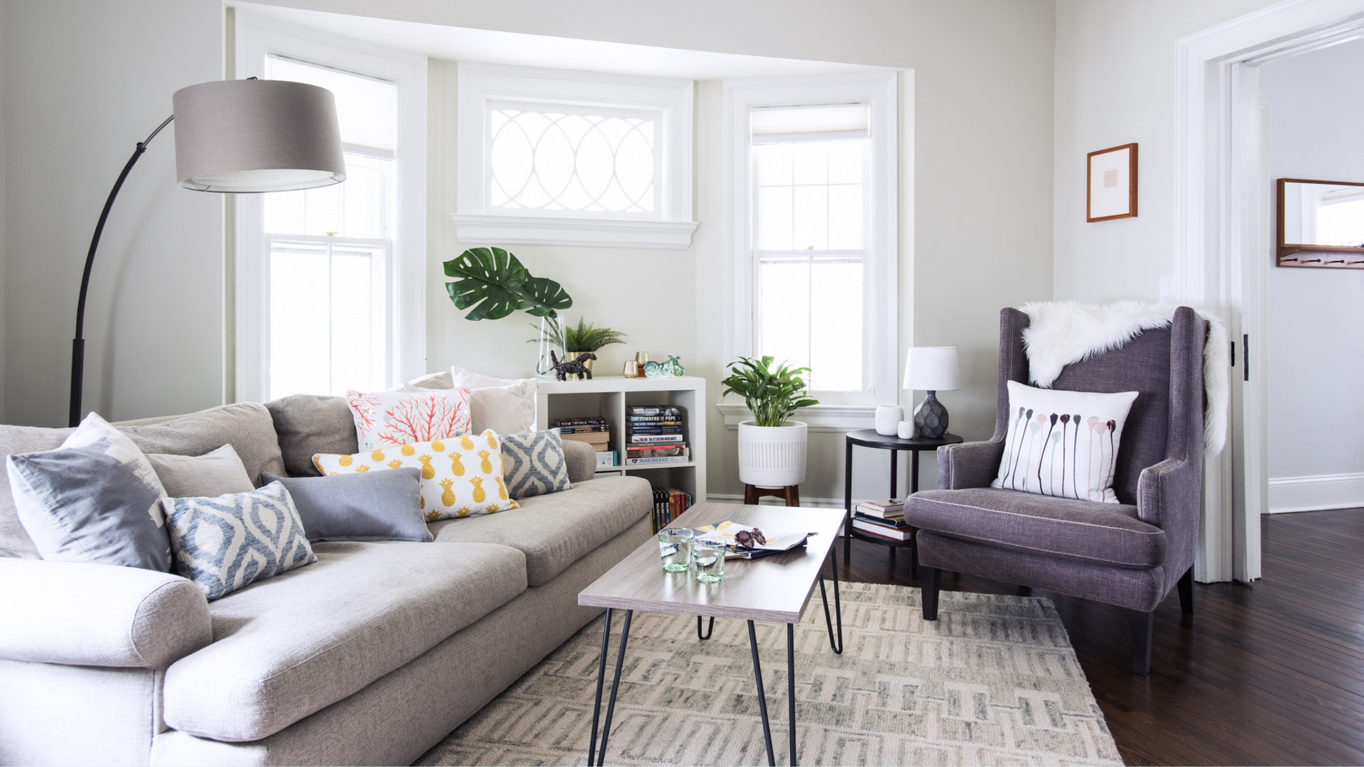 a living room with a couch a chair and a coffee table