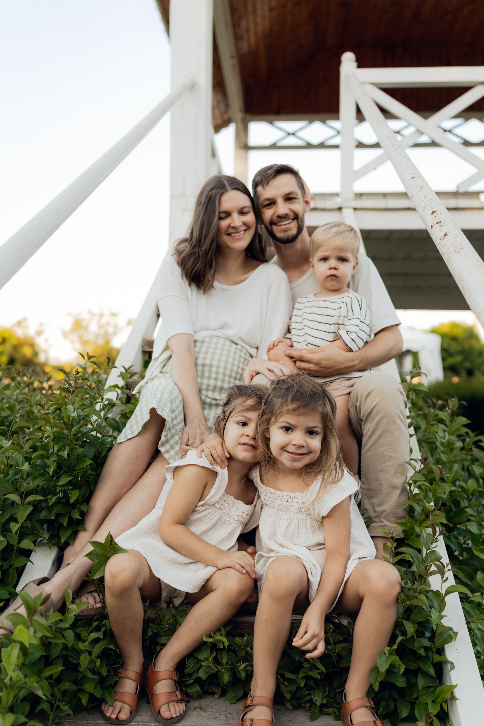 An advisor and family reviewing insurance options at a desk