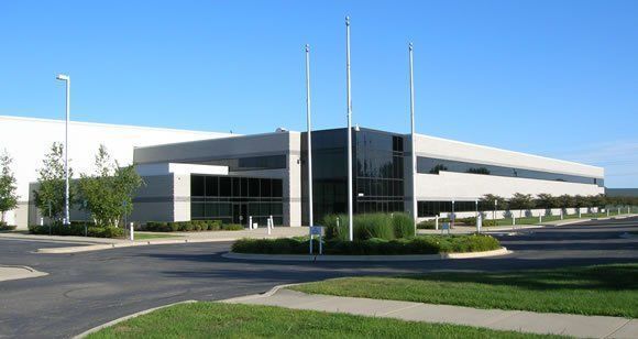 A large white building with a lot of windows