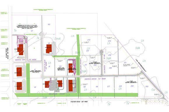 A blueprint of a residential area with lots of buildings and streets.