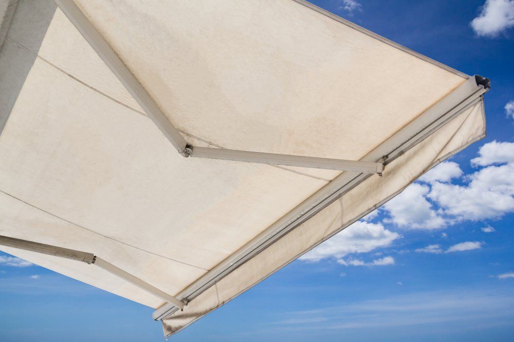 White Awning Against Blue Sky — We Install Security Screens in Brisbane CBD