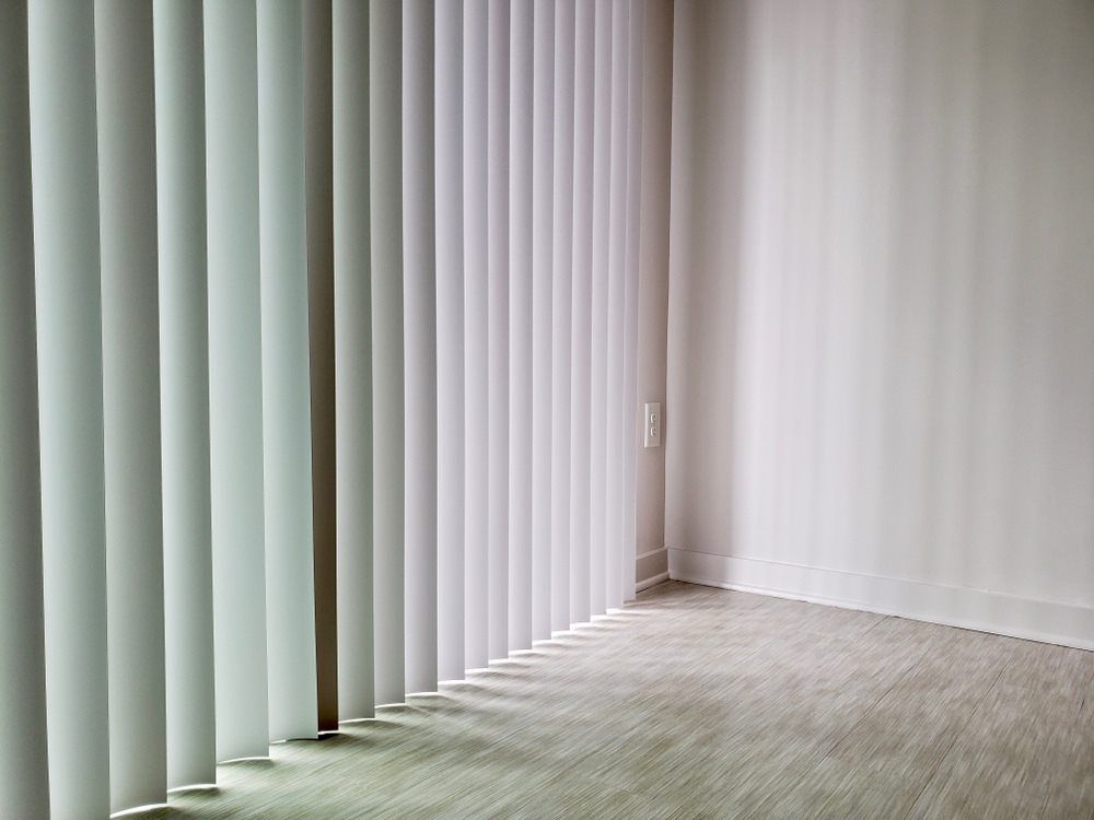 white vertical blinds