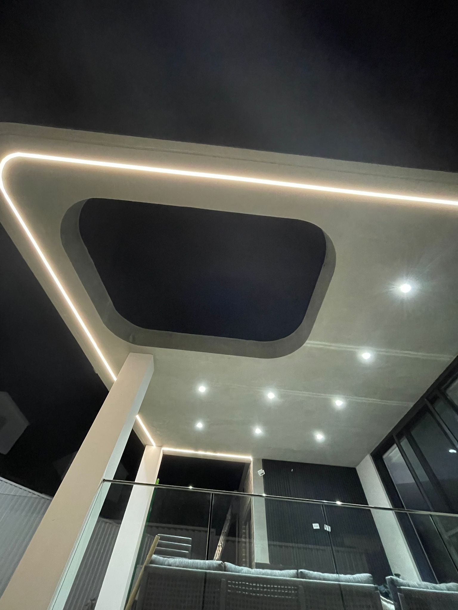 Looking up at the ceiling of a building at night