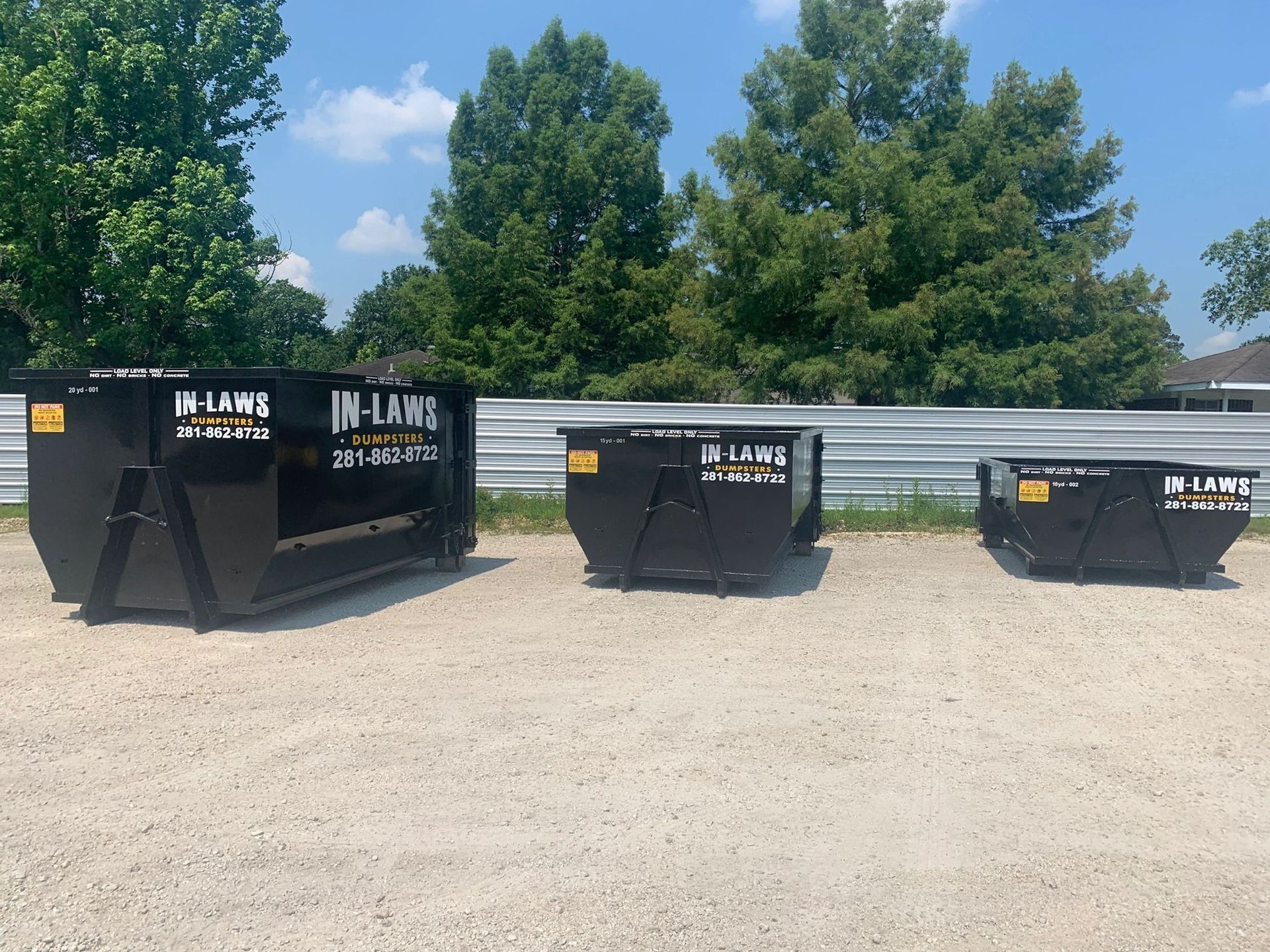 In-Laws roll-off dumpster at a Houston home after storm damage