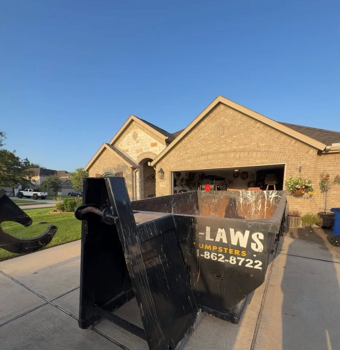 A photo of a Houston garage cleanout before hurricane season, with the help of a dumpster rental.