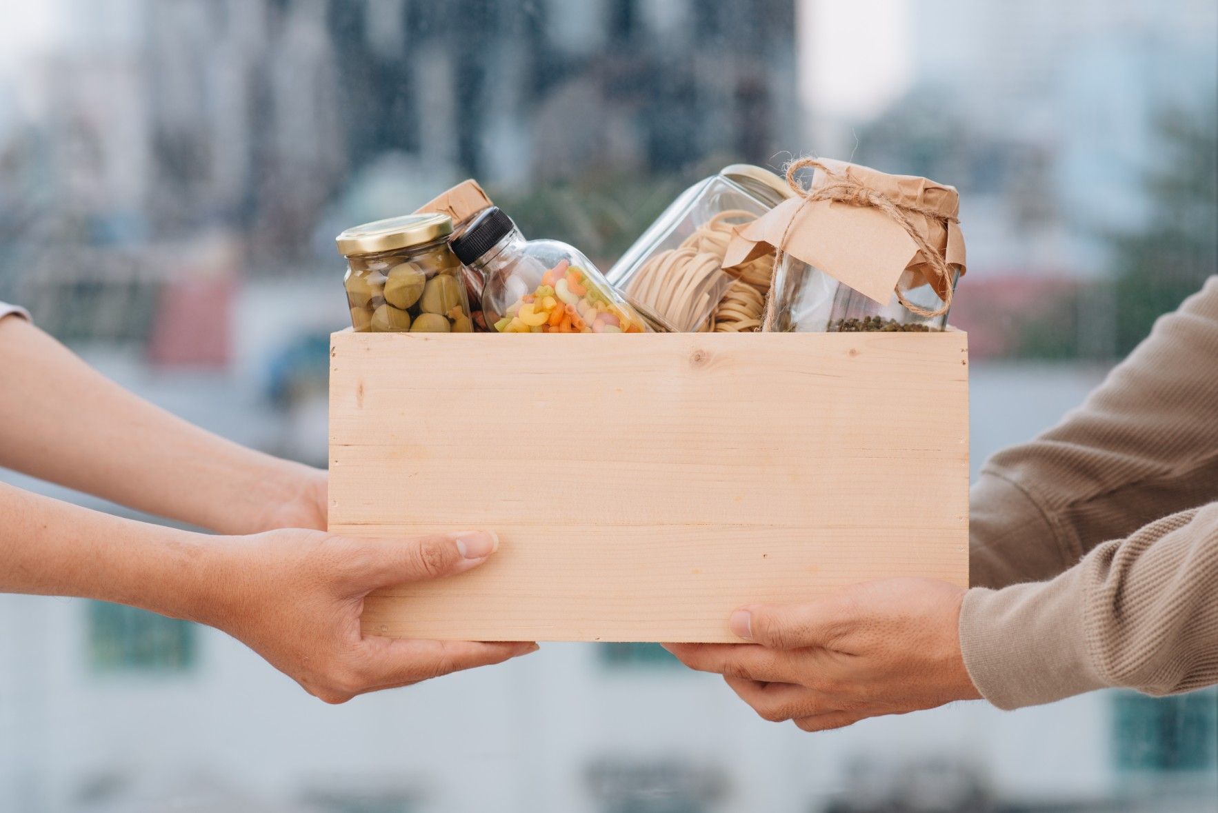 holding a box of food
