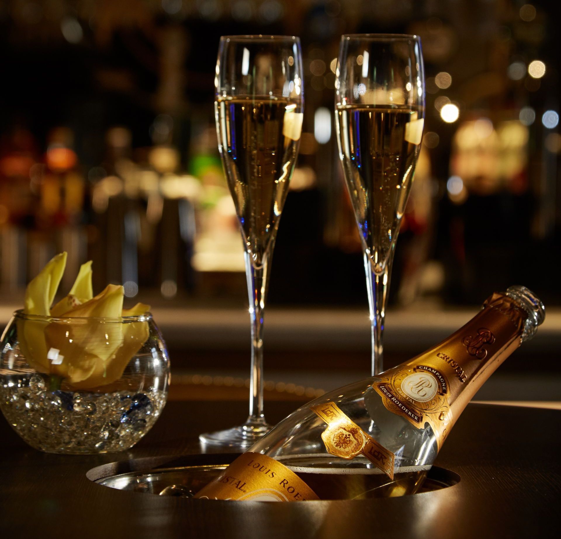 champagne at the bar in la dragon