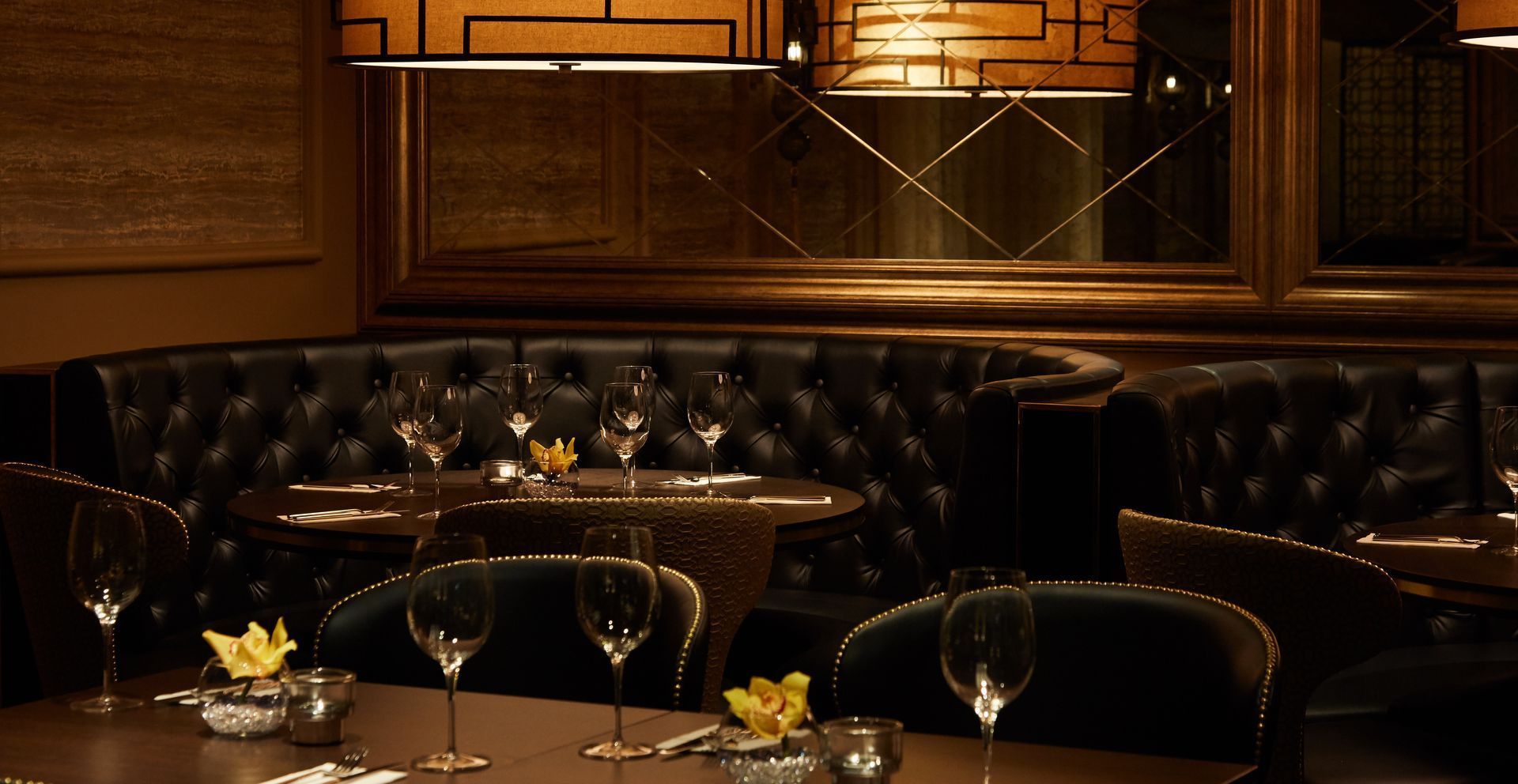 Back corner of interior of La Dragon showcasing the booths