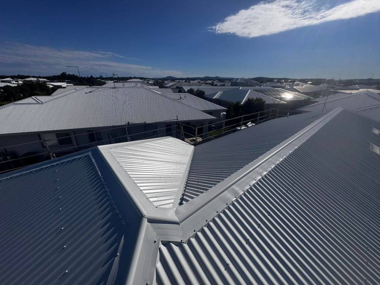 View From a Rooftop Showing the Pattern on the Metal Roofs of Buildings. — Rumara Roofing in Sunshine Coast, QLD