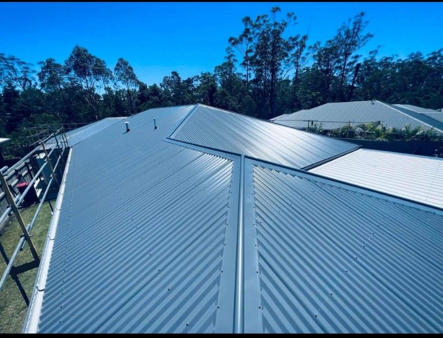 View of a Newly Installed Corrugated Metal Roof on a House — Rumara Roofing in Sunshine Coast, QLD
