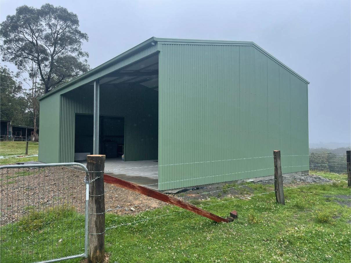 Green Metal Shed With Open Side — Bridgey's Constructions in Taree, NSW