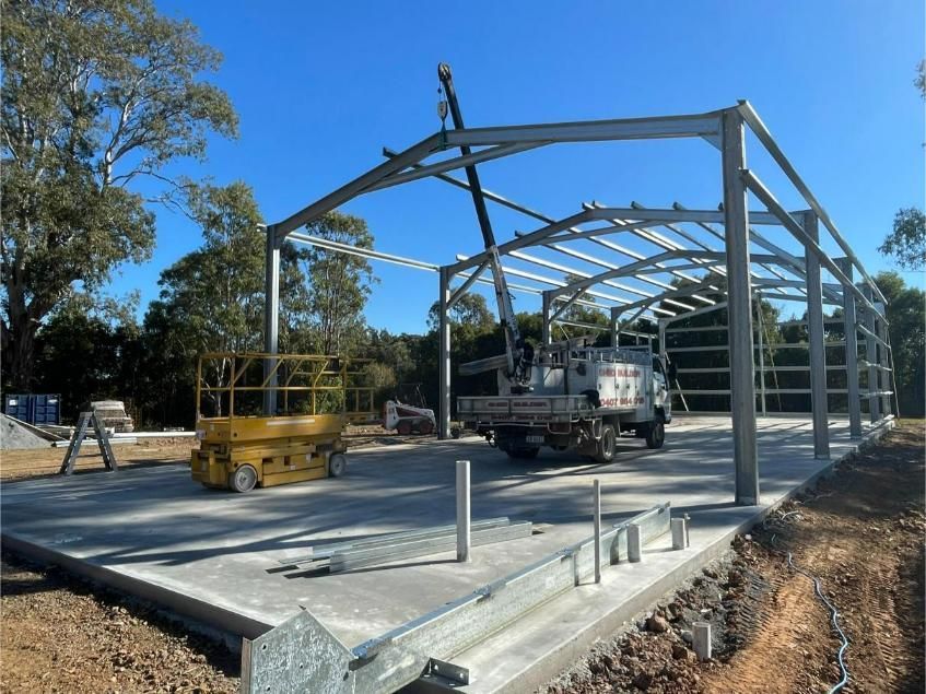Construction Site With a Steel Frame Building Under Construction — Bridgey's Constructions in Harrington, NSW