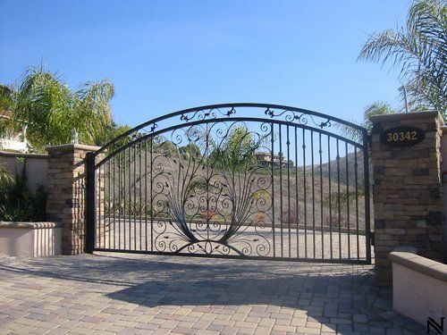A wrought iron gate with the number 30342 on it