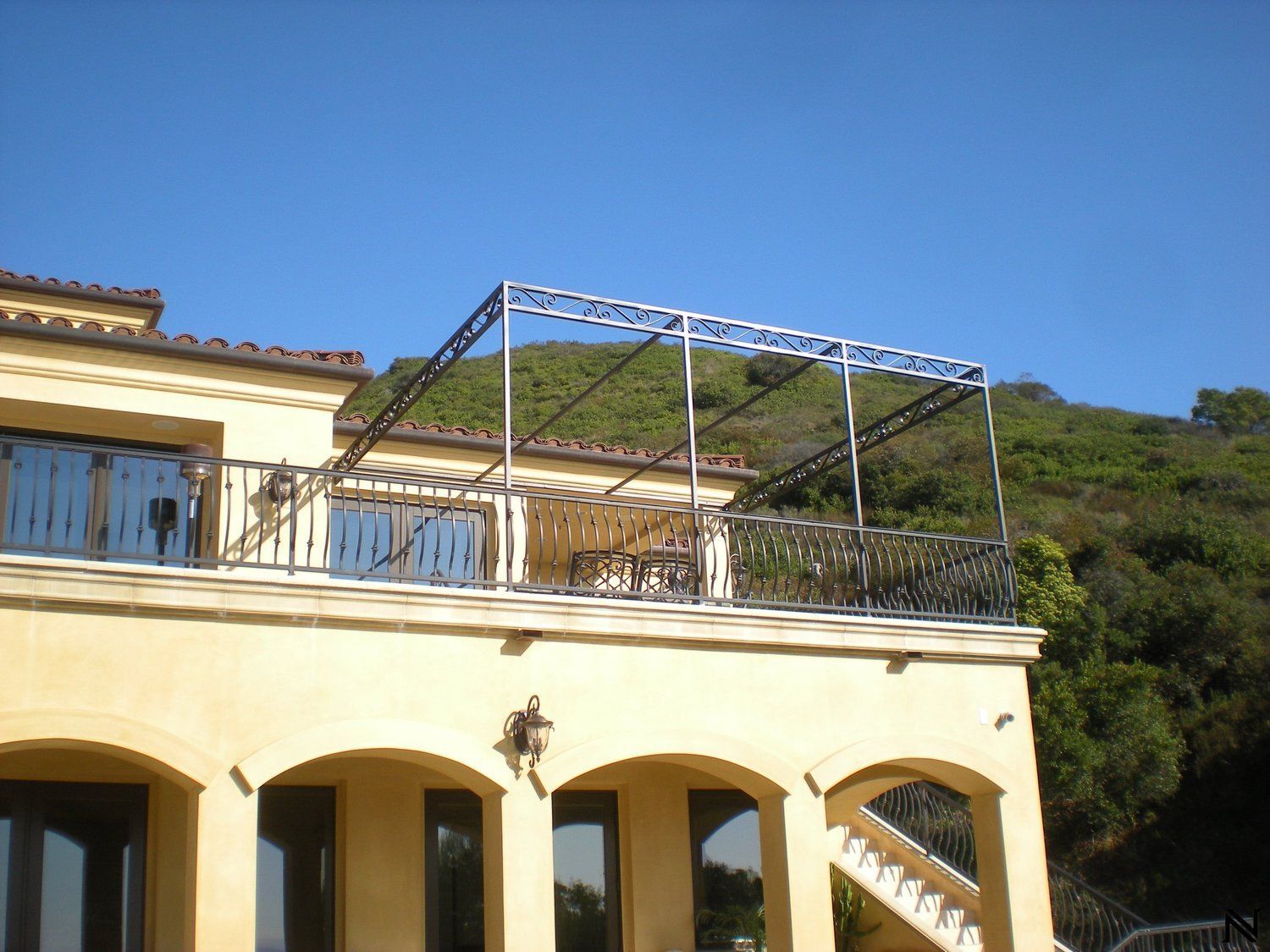A large building with a balcony on top of it