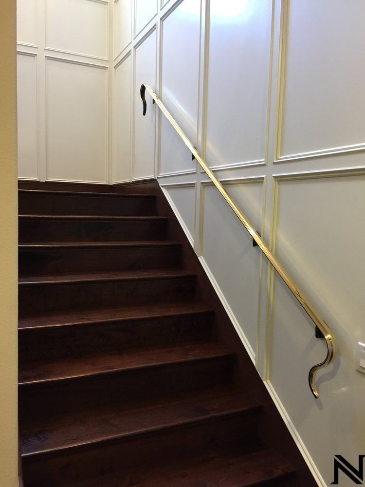A staircase with the letter n on the wall