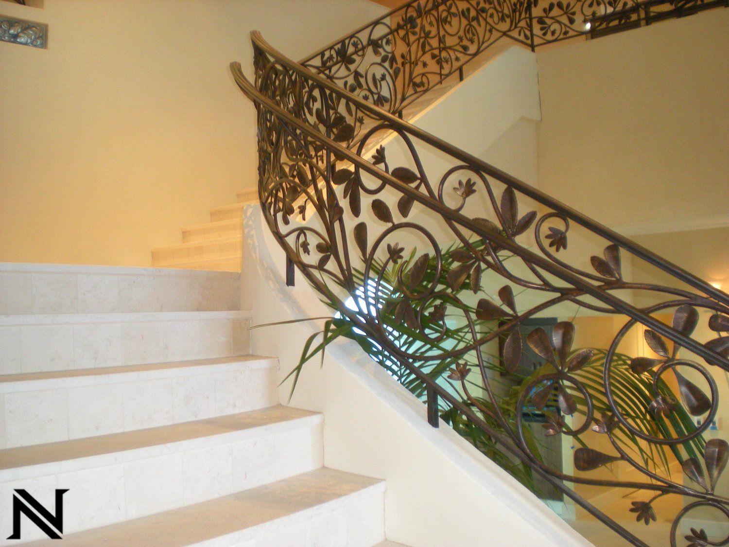 A picture of a staircase with the letter n on the bottom