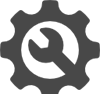 A gear with a wrench in the middle of it.