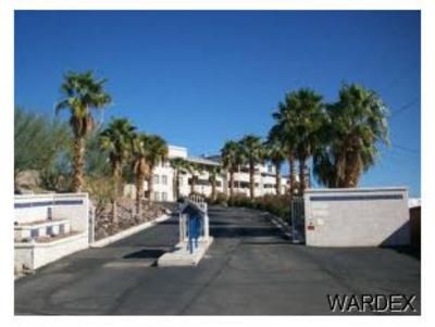 A road with palm trees and a sign that says wardex