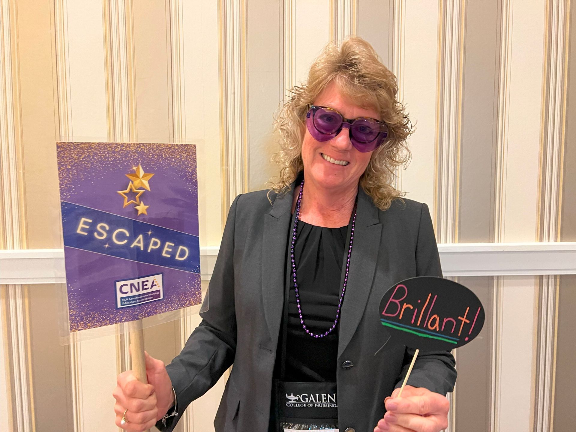 Person holding signs and props