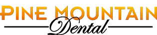 Pine Mountain Dental logo in orange and black with stylized script text