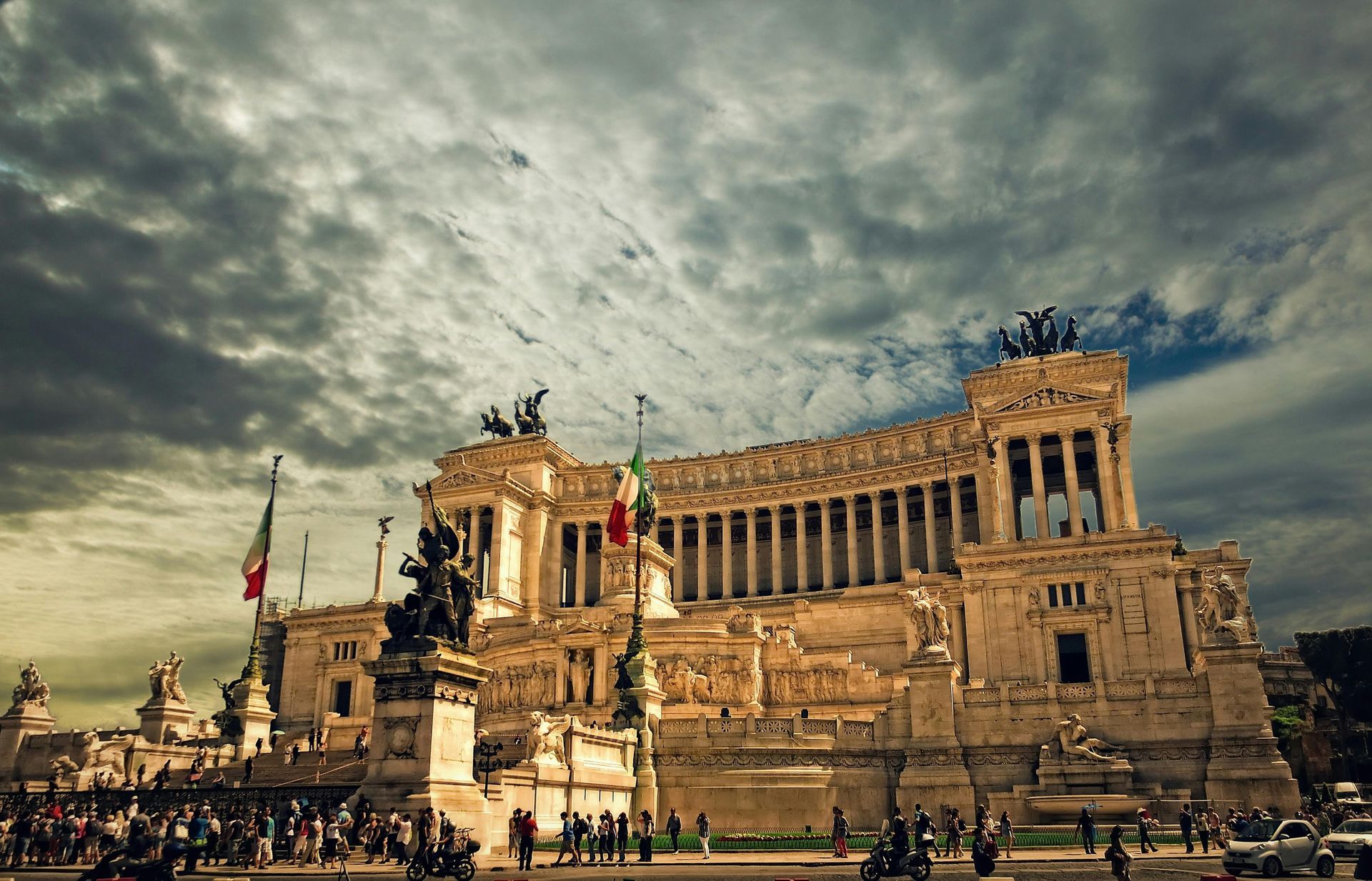 A large building with a statue on top of it