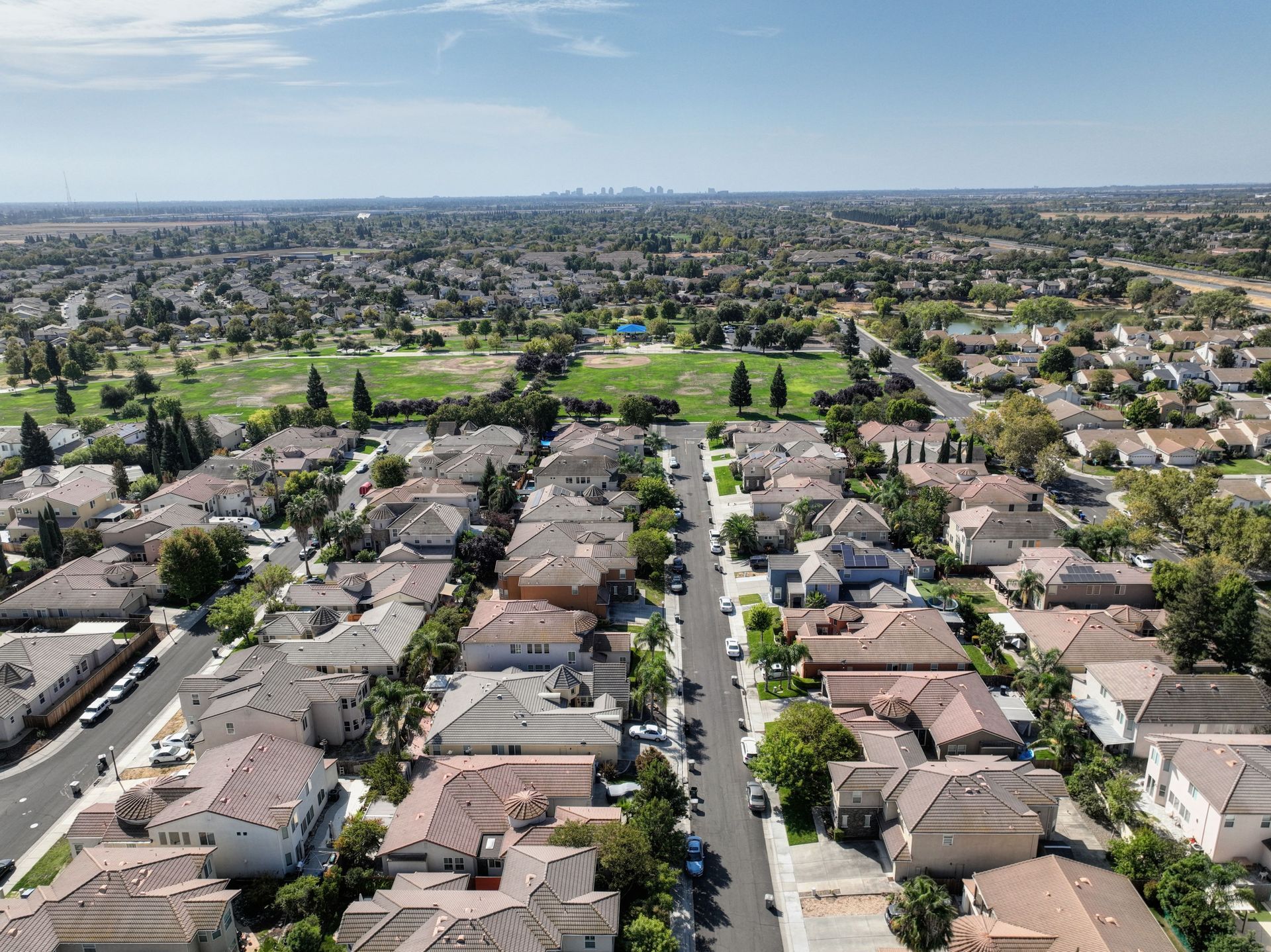 Real estate agents showing floor plans in Sun City West.