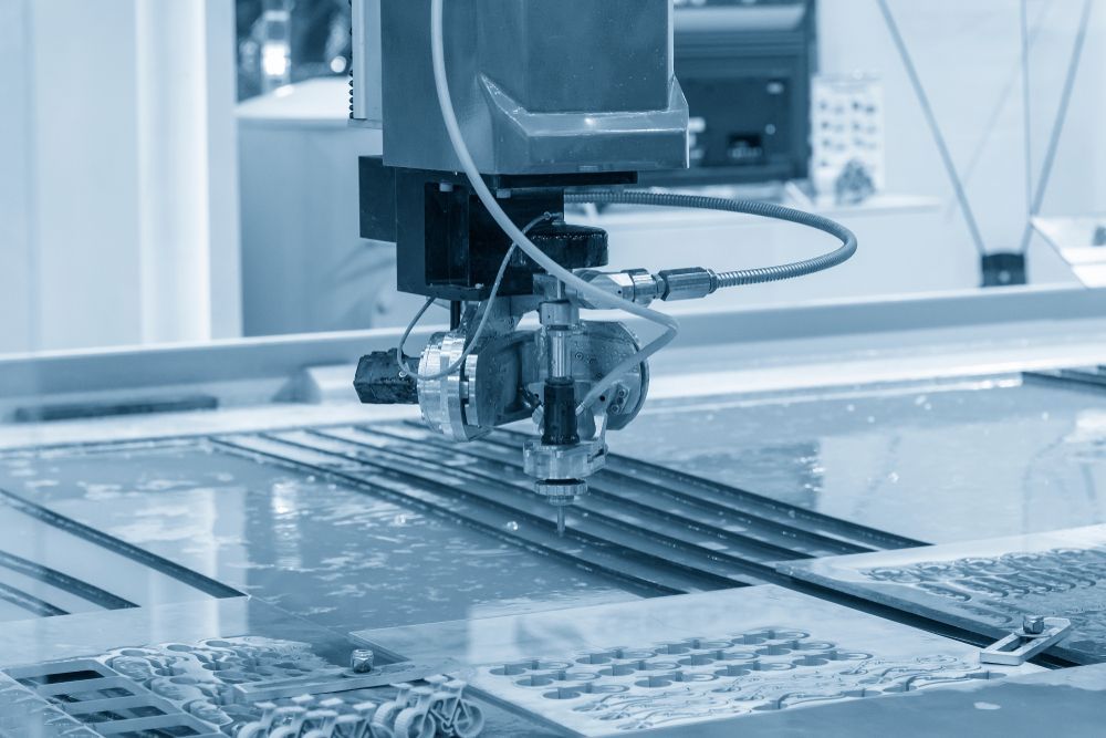 A Machine is Cutting a Piece of Glass in a Factory — NQBC Pty Ltd in Bowen, QLD