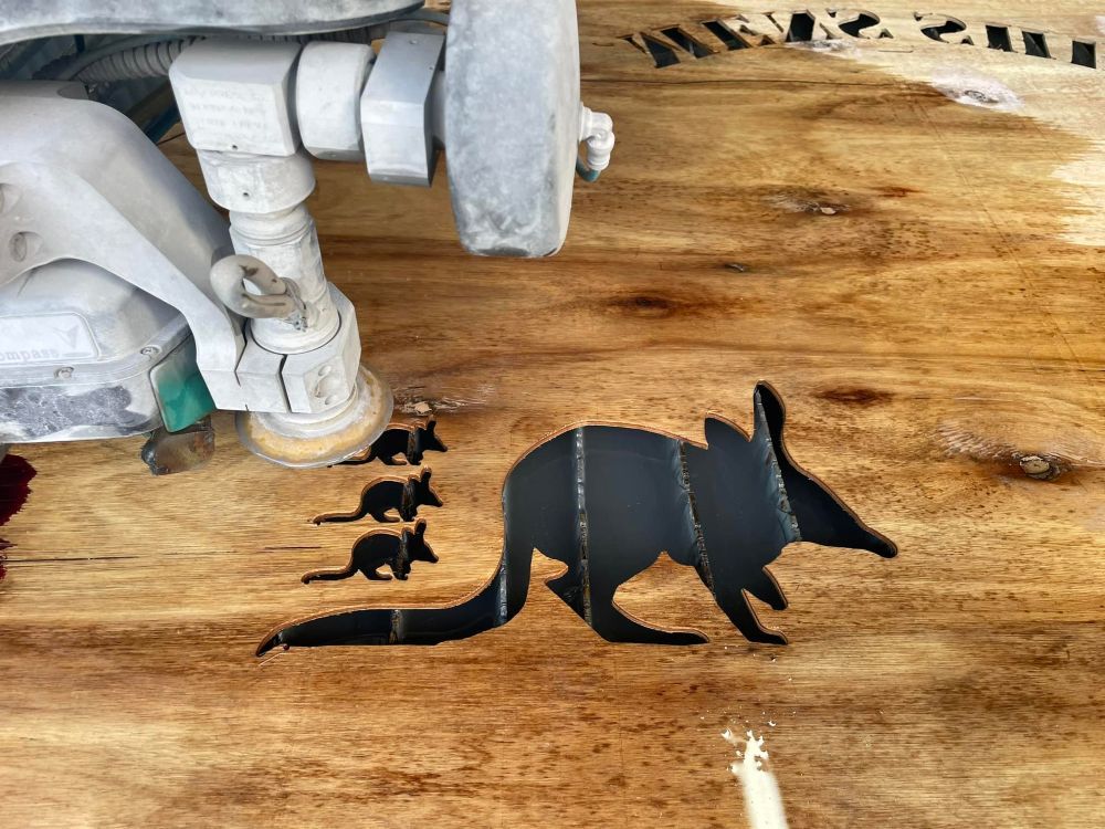 A Stencil of a Kangaroo on a Wooden Surface — NQBC Pty Ltd in Collinsville, QLD