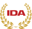 IDA logo with gold laurel wreath and red letters.