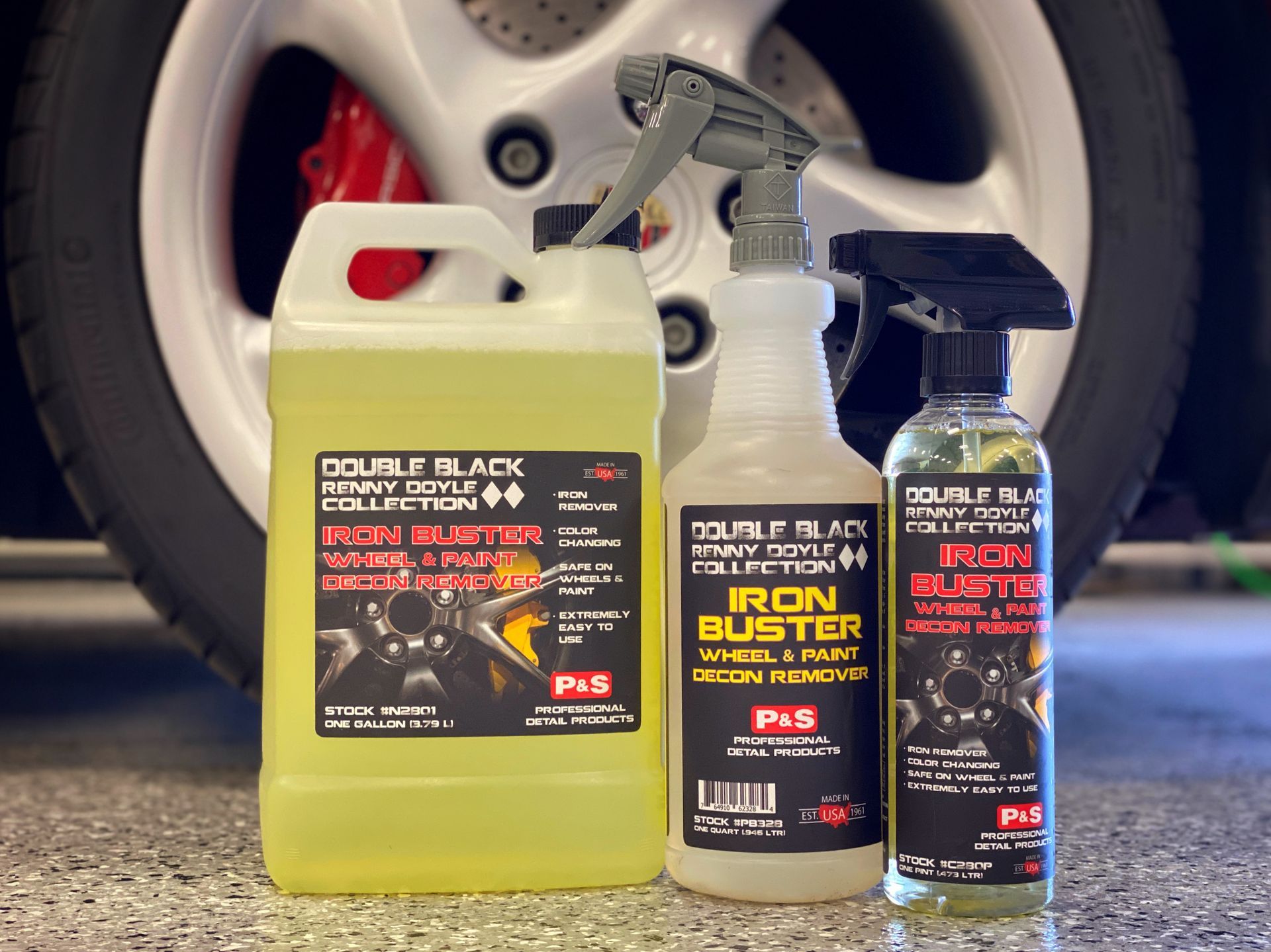 Three bottles of car detailing products, including