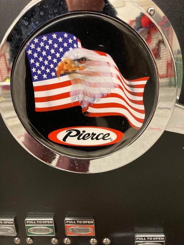 Black control panel with eagle and American flag graphic.