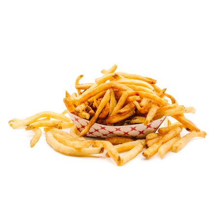 Fries in a red and white container, with some fries spilling out, against a white backdrop.