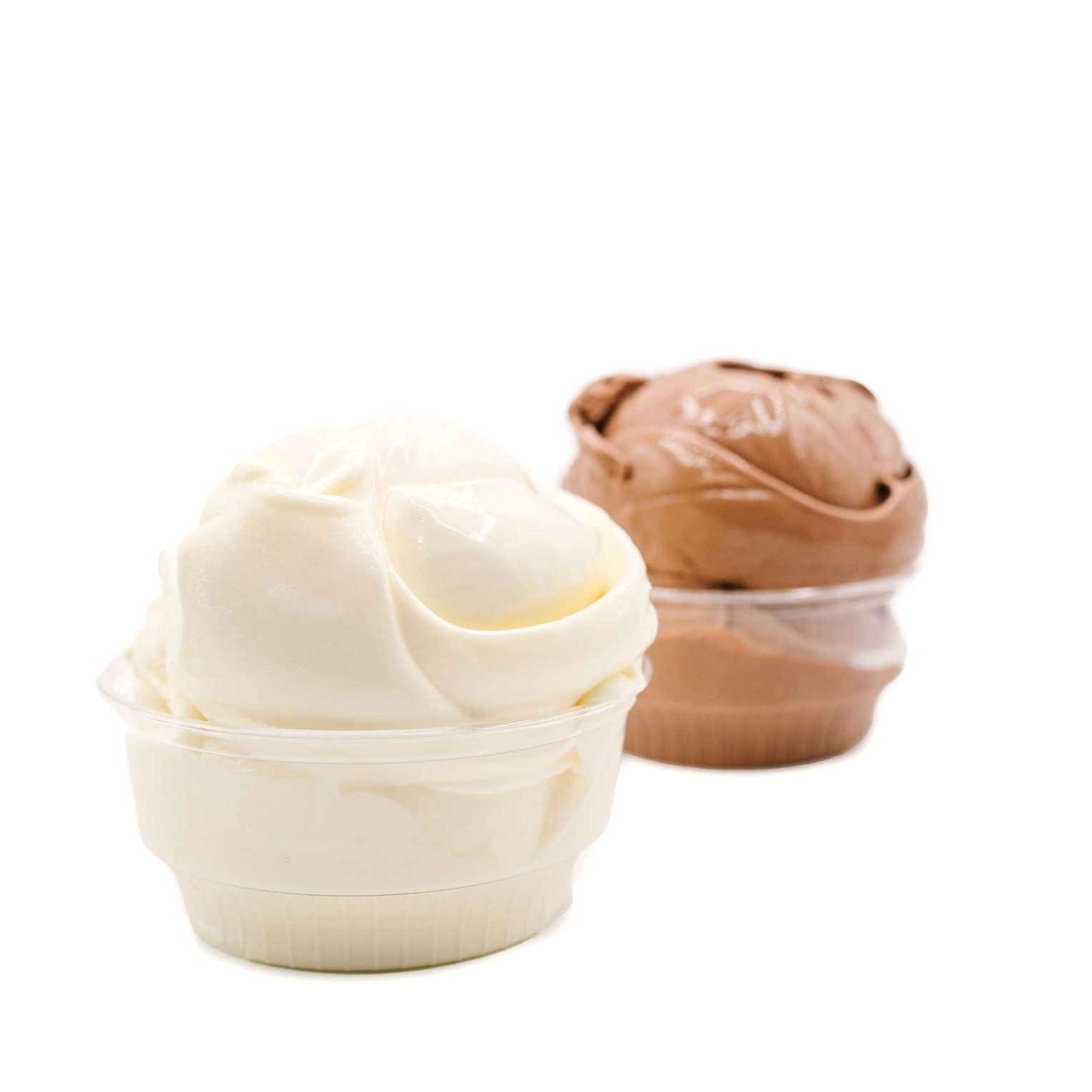 Vanilla and chocolate ice cream in clear plastic cups.