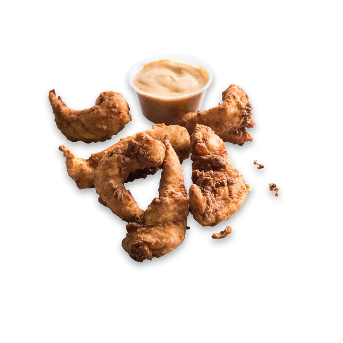Fried chicken pieces with dipping sauce.