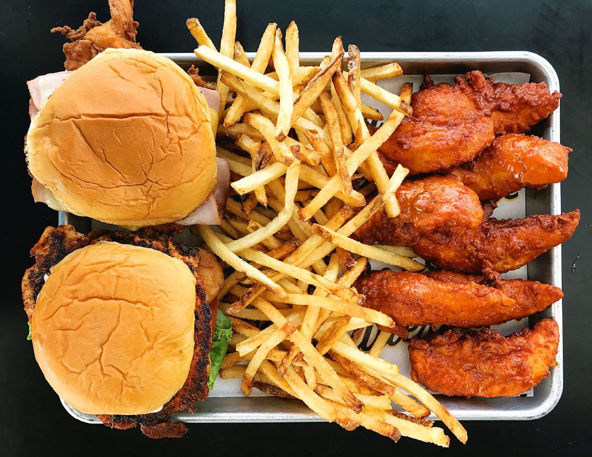 Super chix chicken sandwiches with fries and wings.